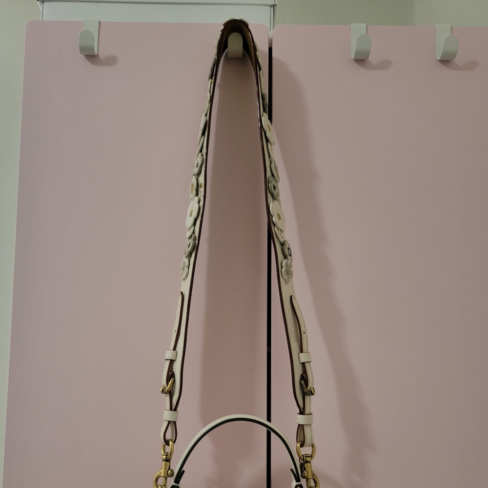 White flower shoulder strap